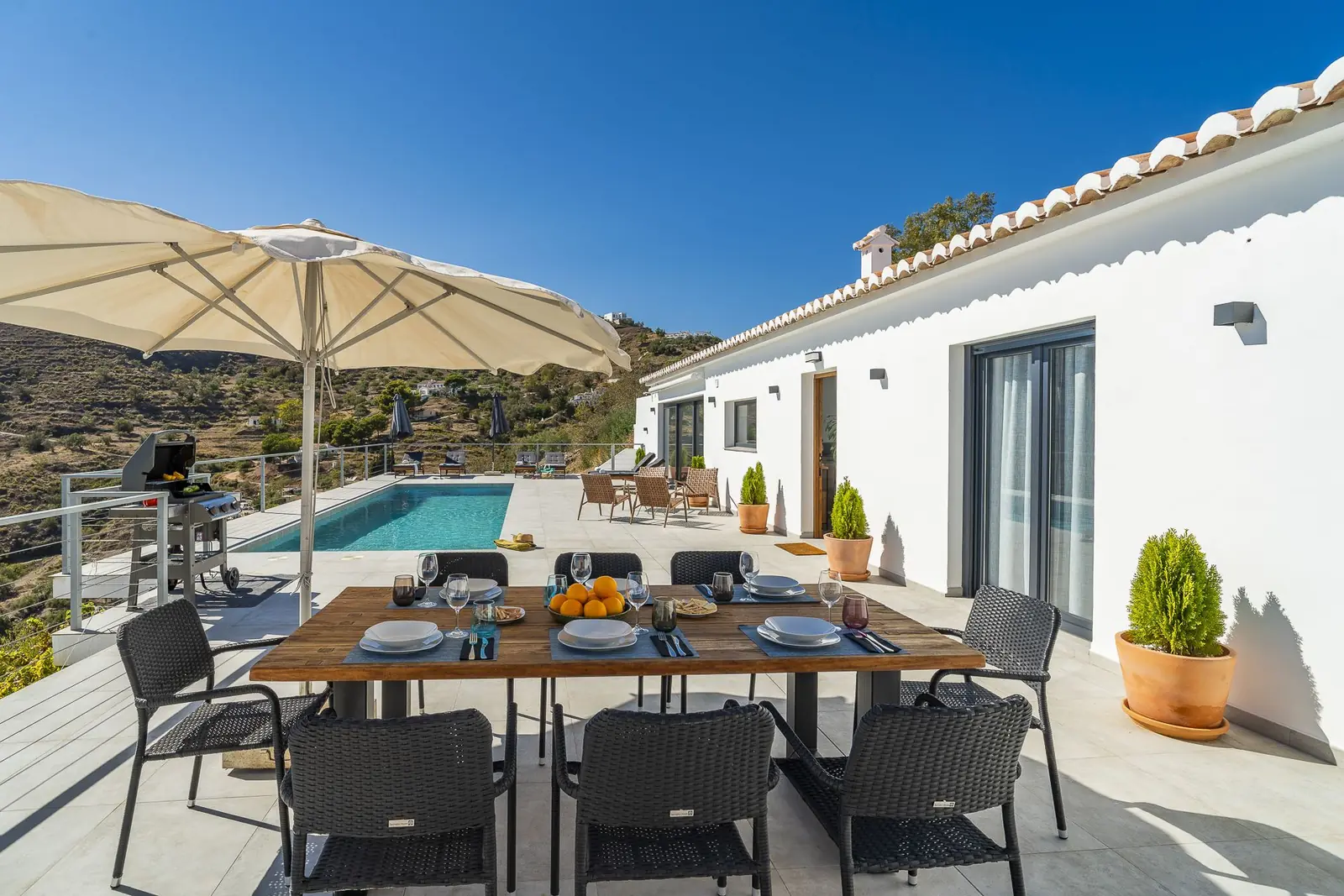Terrace dining area by the pool