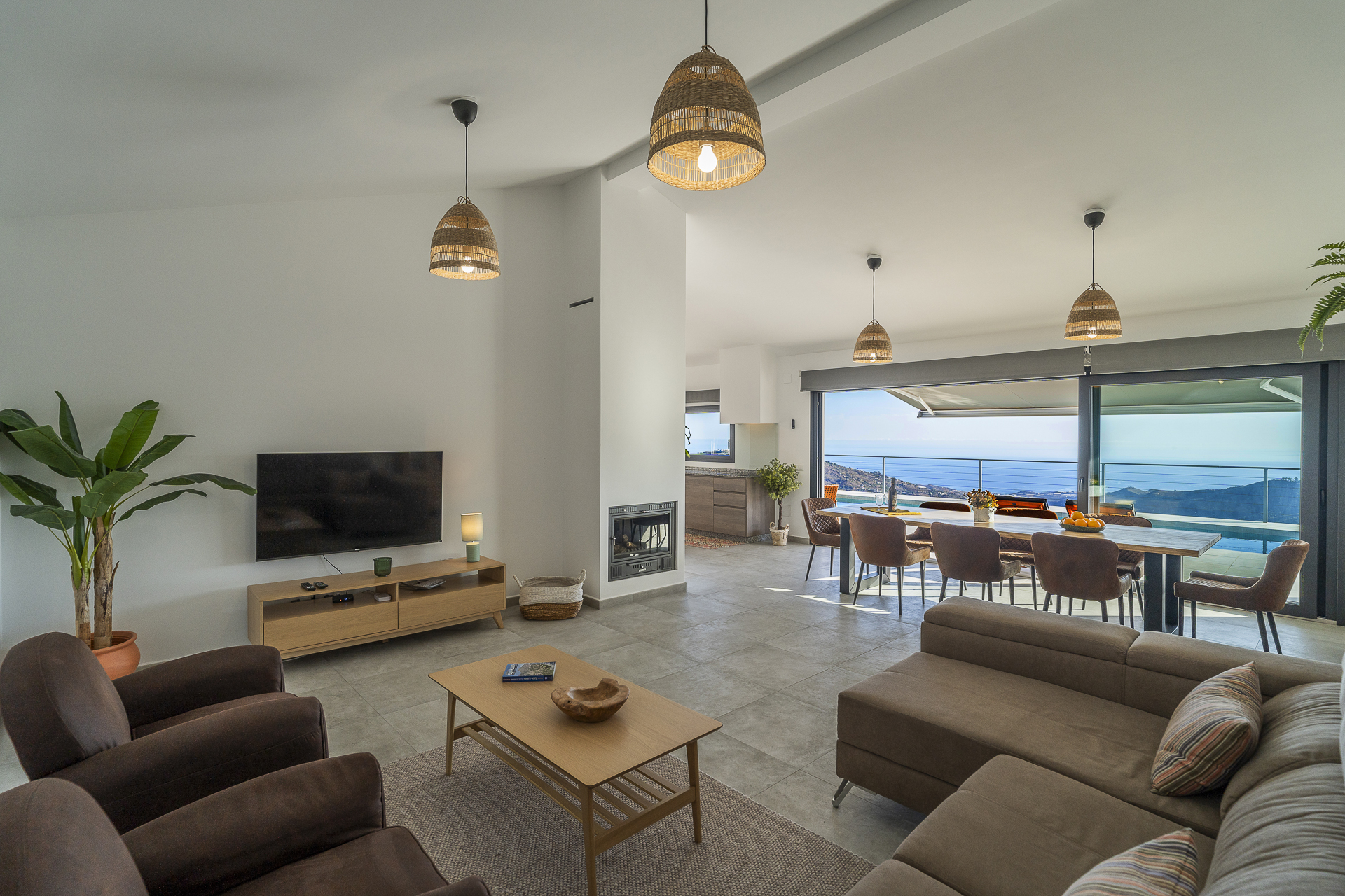 Living room with TV and sea views